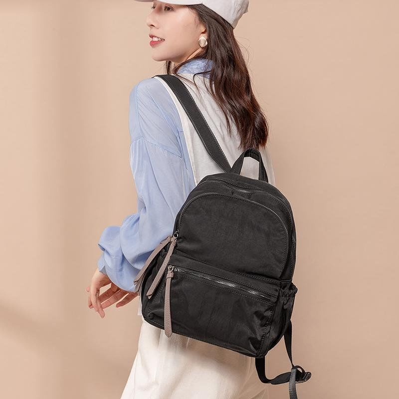 tas sekolah pria  ransel nilon ransel premium kain kanvas premium sera ransel wanita 2023 baru versi Korea dari pasang liar Oxford kain ransel fashion kasual tas travel berkapasitas besar