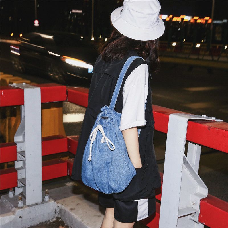 ∈Ransel denim retro sera dengan saku serut fashion sederhana ransel all-match tas travel kasual tas serut wanita