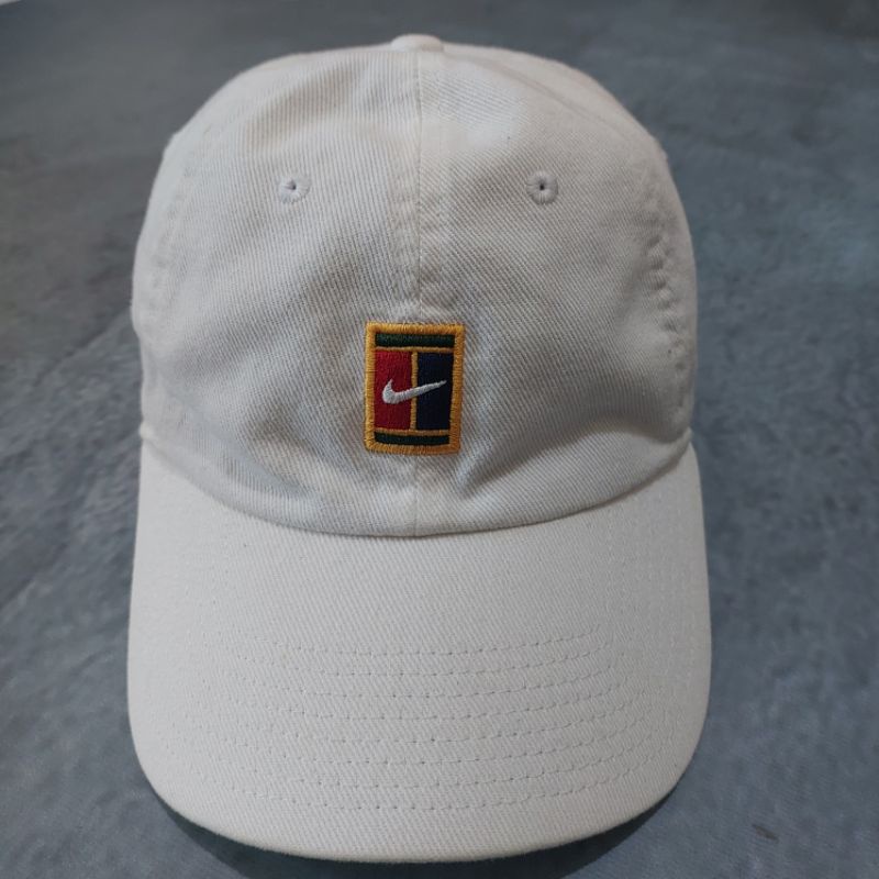 topi bekas second nike court