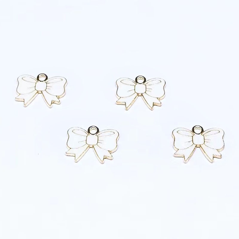 4pcs Liontin Bentuk Pita Bahan Metal Untuk Aksesoris Gelang Anting