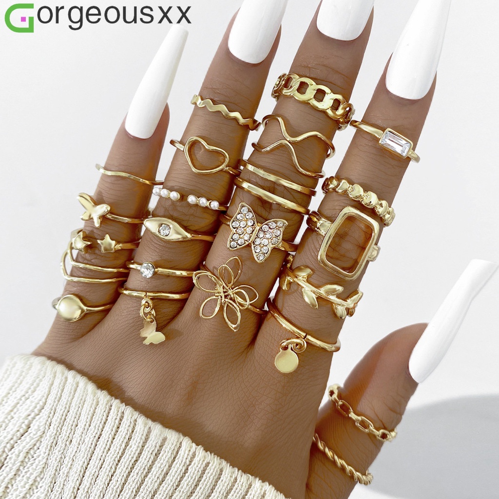 23pcs / set Cincin Bentuk Hati Kupu-Kupu Bunga Geometris Model Putar Berlapis Untuk Wanita