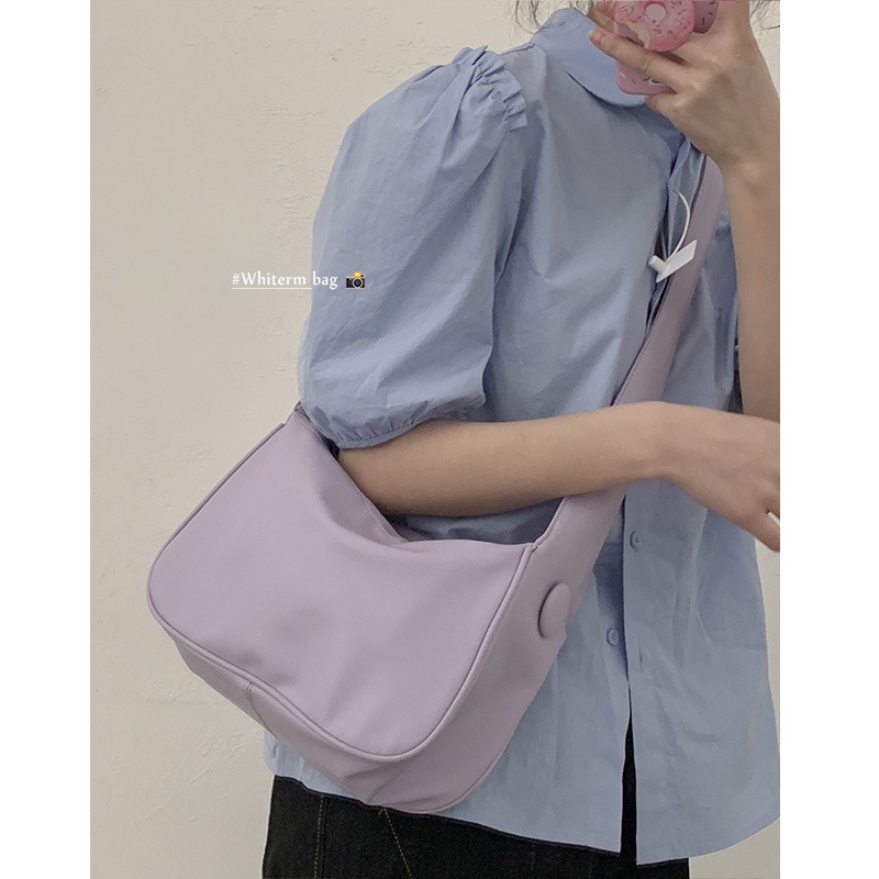 Suhao all-match tas berkapasitas besar wanita musim panas 2021 mode trendi baru versi Korea dari tas pelana tekstur niche messenger bag