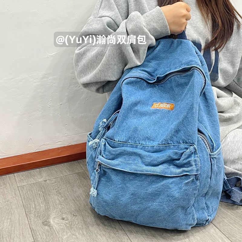 Sera mahasiswa Amerika high street retro denim ransel tua dicuci tas sekolah malas siswa ransel untuk pria dan wanita