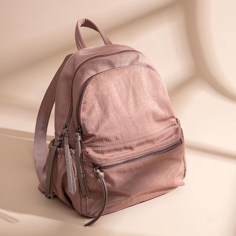 tas sekolah pria  ransel nilon ransel premium kain kanvas premium sera ransel wanita 2023 baru versi Korea dari pasang liar Oxford kain ransel fashion kasual tas travel berkapasitas besar