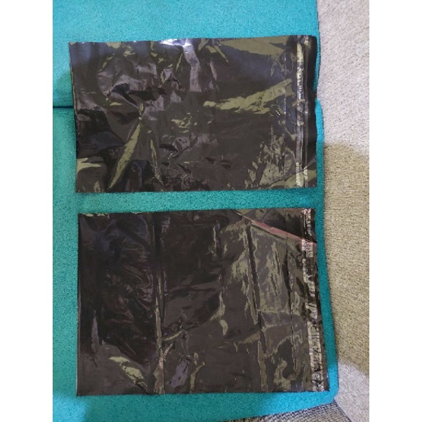 

plastik Polymailer hitam cetak 30x40 lokal premium Grade A Glosy