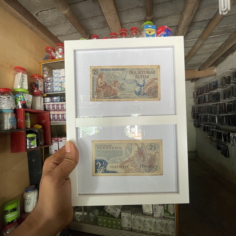 pajangan dinding uang kertas 2.5 rupiah