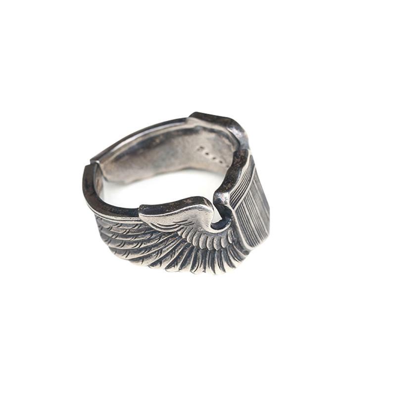 Cincin Model Terbuka Desain Medali Sayap Bahan Metal Gaya Rock Untuk Pria