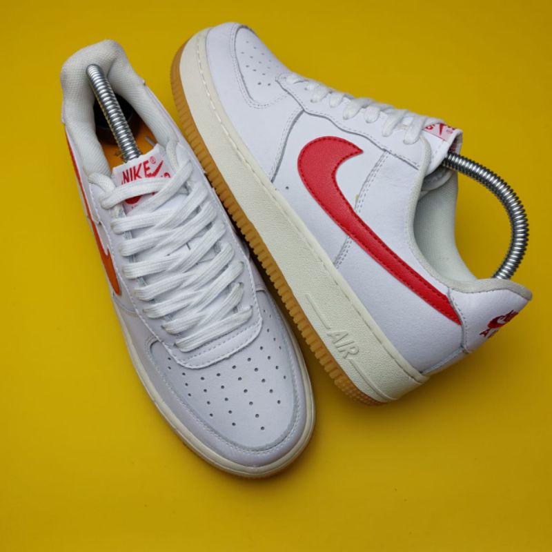 Nike AF1 red swoosh