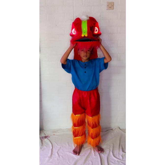 Mainan anak barongsai dan celana mata menyala