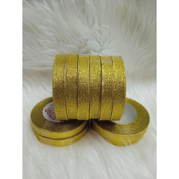 pita gold ukuran 1,25 cm 20 yard