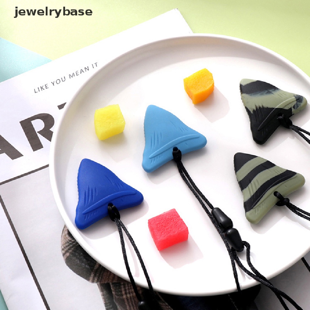 Mainan Kunyah Bentuk Segitiga Bahan Silikon Untuk Anak Autis