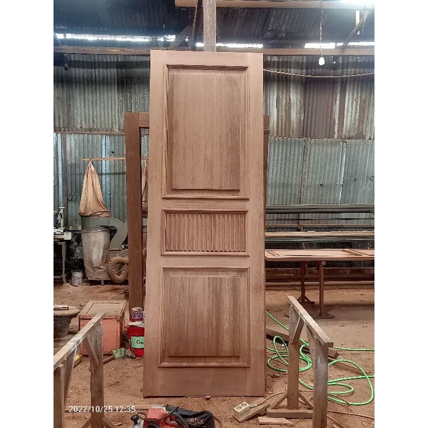 pintu panil list timbul , kayu merbau oven 82 x 220