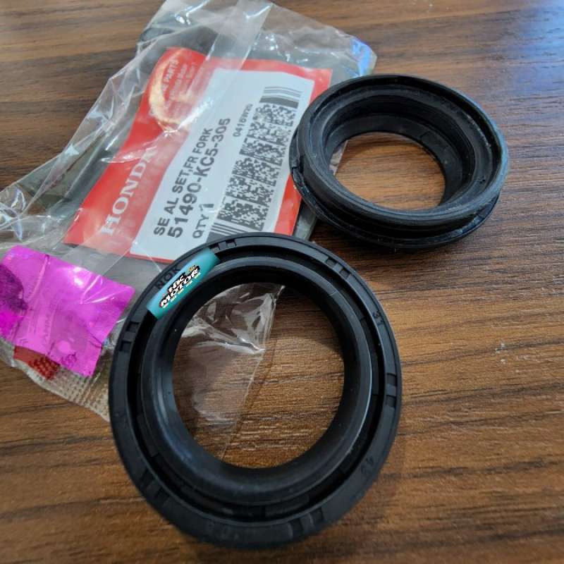 OLISEAL/SEAL SOK DEPAN SET+TUTUP ABU ORI HONDA MEGA PRO/TIGER/VERZA KC5