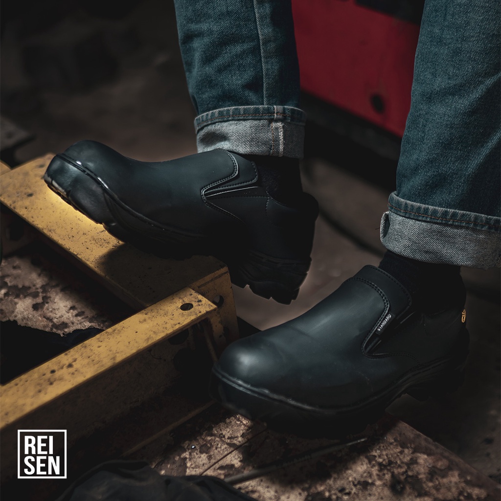 REISEN GEAR - STANDARD SLIP ON | SEPATU SAFETY TANPA TALI MODEL STANDARD WARNA HITAM SAFETY SHOES PABRIK ANTI SLIP UJUNG BESI