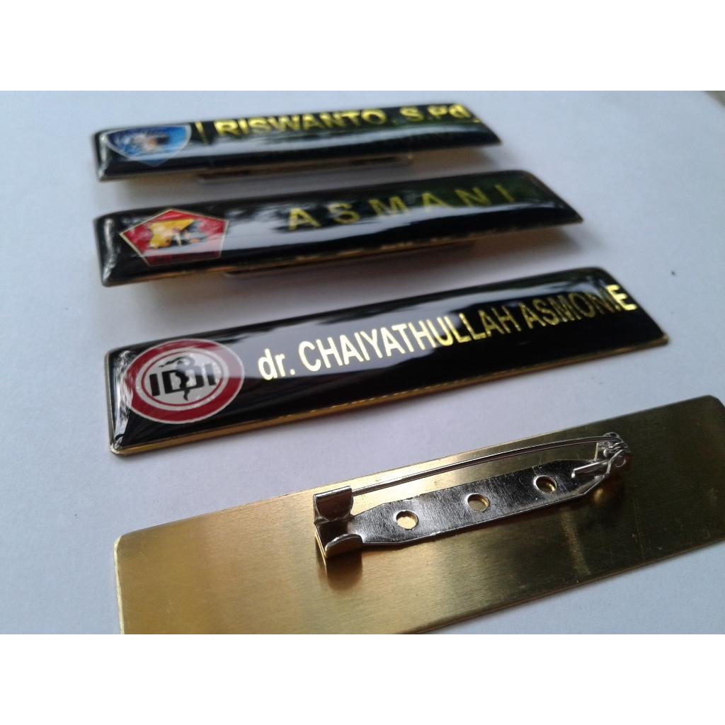 

PAPAN NAMA KUNINGAN RESIN/NAMETAG KUNINGAN PENITIK/NAMA DADA PENITIK