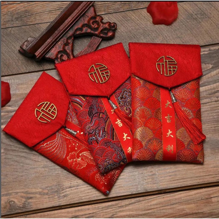 

angpao dompet imlek sangjit pernikahan merried bentuk dompet satin dengan rumbai