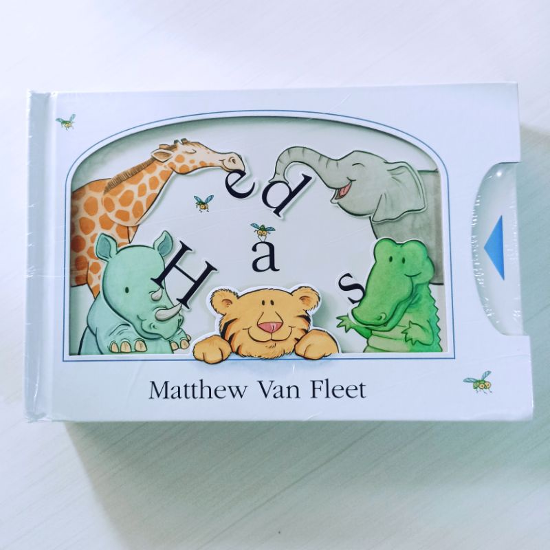 Heads by Matthew van Fleet - Interactive board book