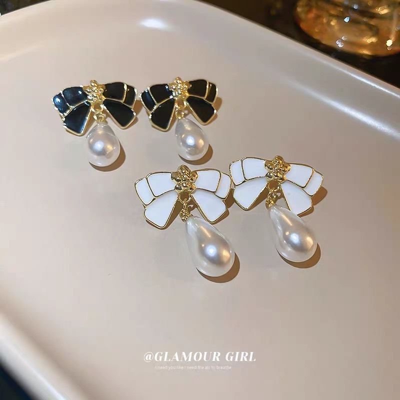 Anting 925 Silver Needle Bentuk Pita Aksen Mutiara Gaya Retro Hong Kong Perancis Desain Chanel