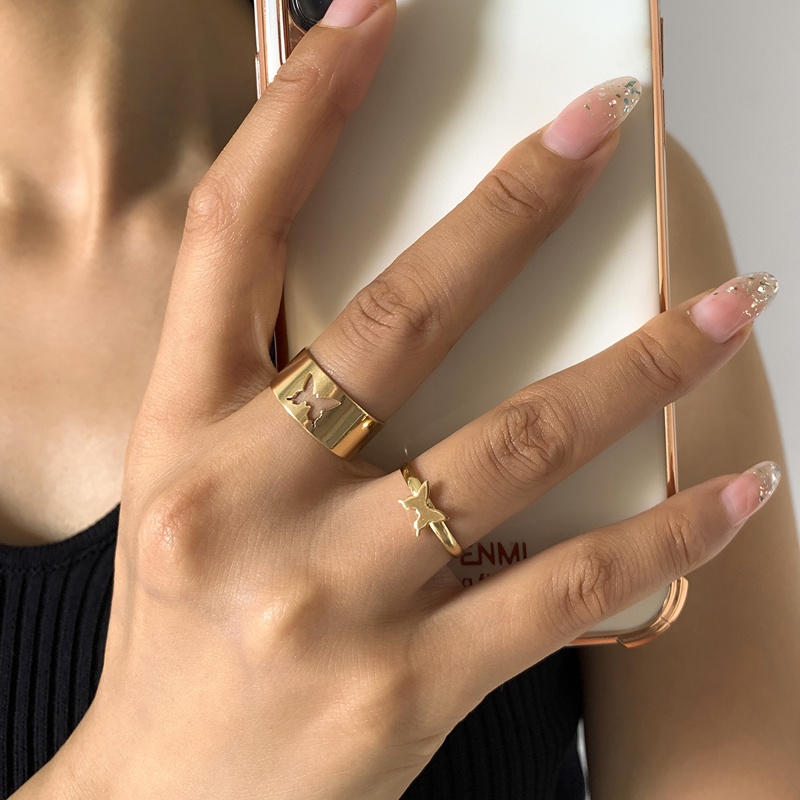 We Flower 2PCs / Set Cincin Desain Kupu-Kupu Hollow Gaya Punk Untuk Pria / Wanita