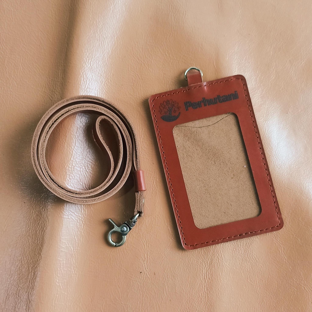 

Tanda pengenal kulit asli bisa custom nama dan logo