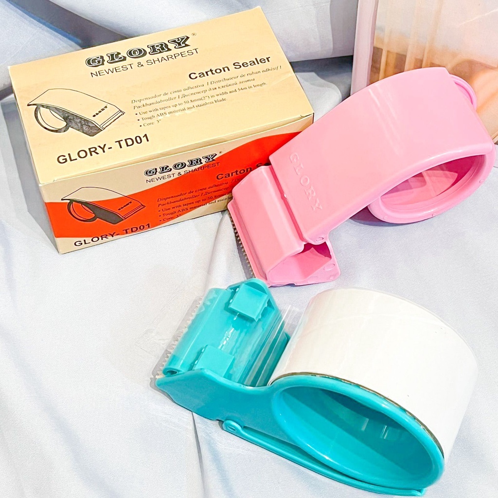 

Dispenser Lakban Glory TD01 / Dispenser Tape Lakban Isolasi Selotip Besar Glory Carton Sealer 48mm 2” Up to 3” Kreketan Tempat Pemotong Lakban 2/3 Inch Kuat dan