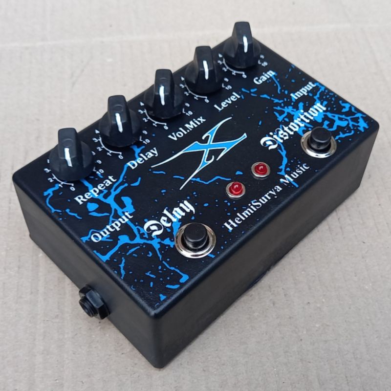 Efek distorsi delay X double dan Adaptor