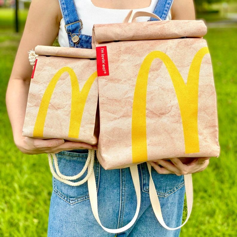 ✧✁✓Sera McDonald s Schoolbag Paper Bag Tas Ransel Wanita Tas Kapasitas Besar Tas Mahasiswa Kelas Kasual Kecil Buku Merah dengan Gaya Yang Sama