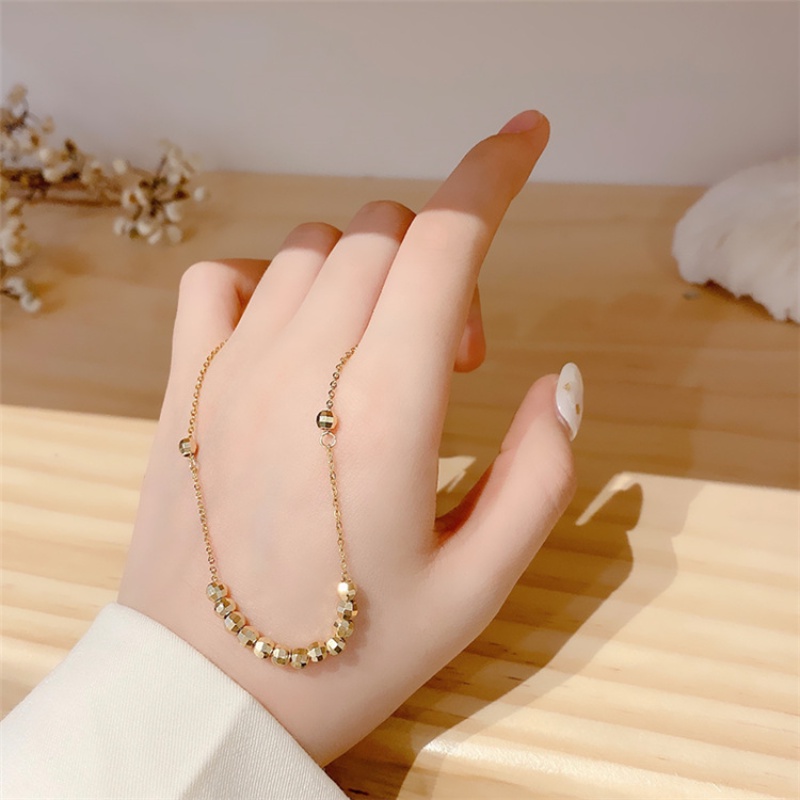 Kalung Rantai Manik-Manik Emas Bahan Titanium Steel Gaya Retro Untuk Wanita