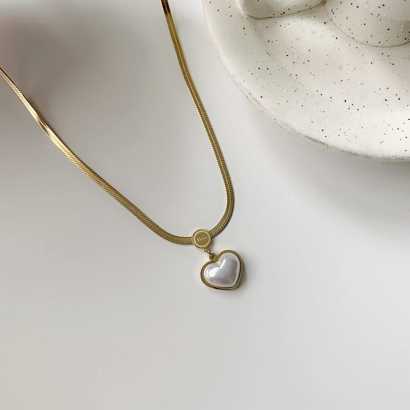 kalung titanium fashion love mutiara besar