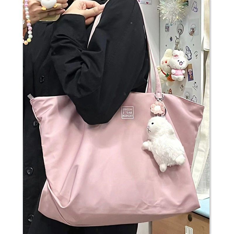 sera cream ungu Zhao Lusi diagonal yang sama tas berkapasitas besar wanita fashion tangan tas jinjing kain nilon tas bahu