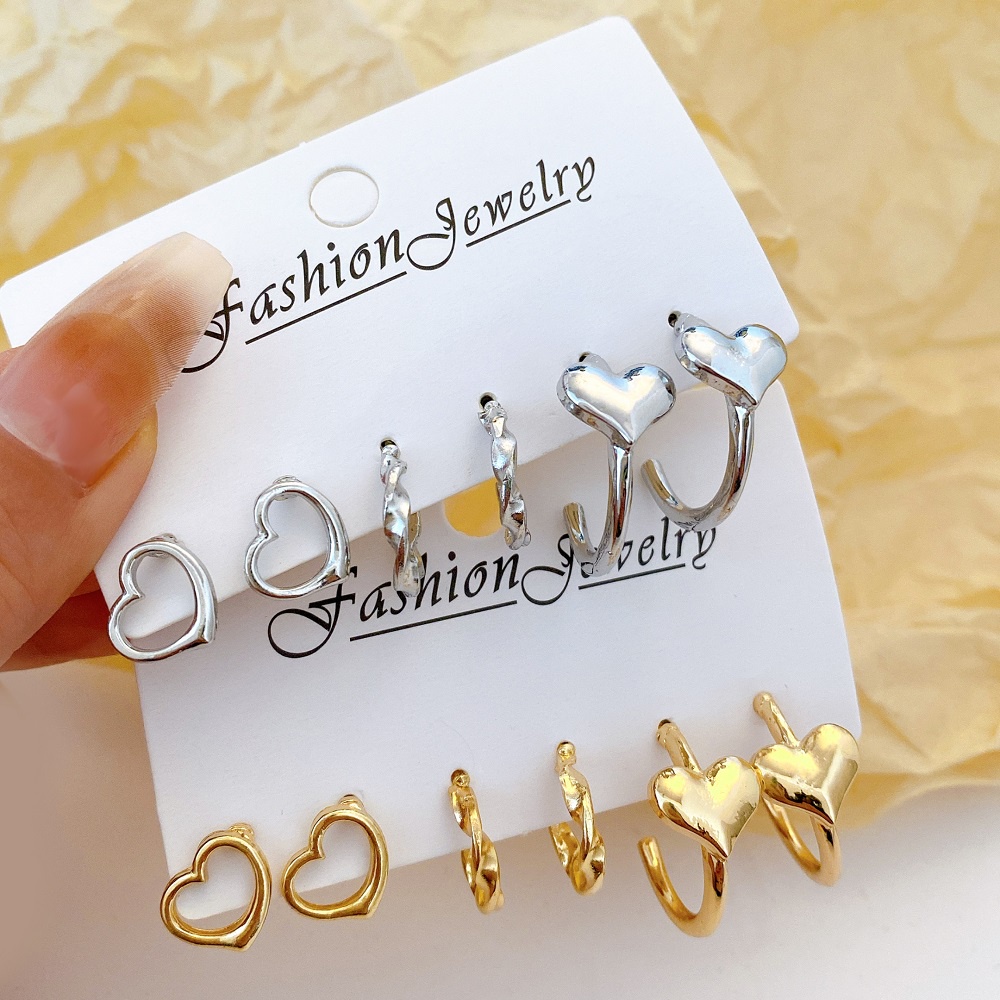 Anting Stud Bentuk Hati Model Hollow Warna Emas Silver Gaya Korea Untuk Wanita