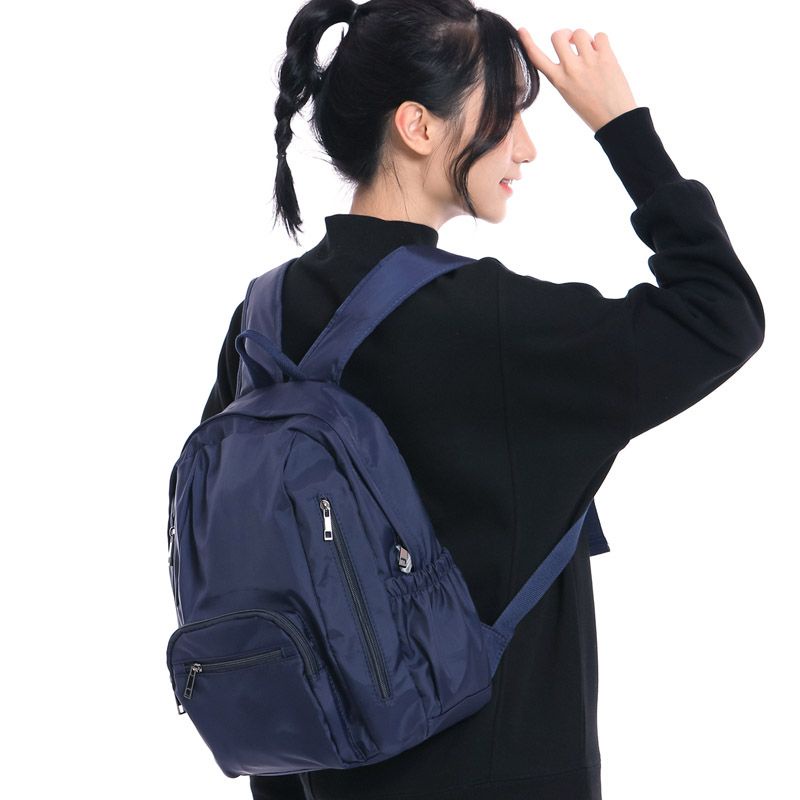 sera multi-saku ringan tahan air ransel kasual perjalanan trendi fashion keren tas sekolah ransel wanita unisex