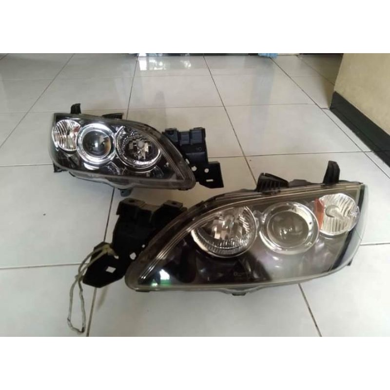 headlamp mazda 3 sedan tahun 2006