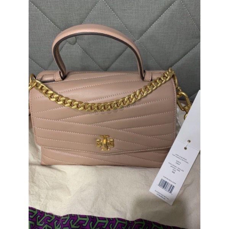 Tory Burch Kira chevron top handle satchel.