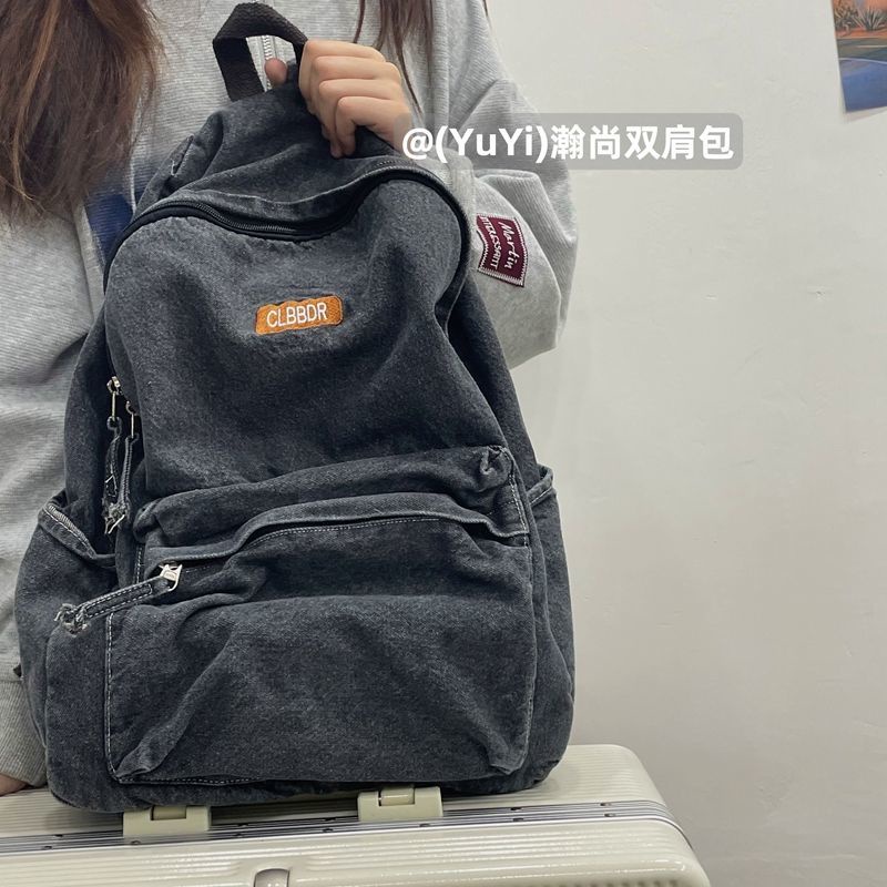 Sera mahasiswa Amerika high street retro denim ransel tua dicuci tas sekolah malas siswa ransel untuk pria dan wanita