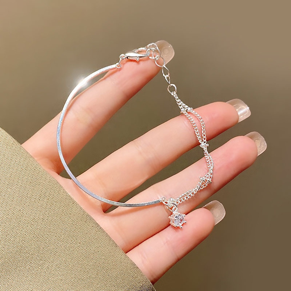 Gelang Rantai Liontin Zircon Asimetris Bahan Titanium steel Warna Silver Untuk Wanita