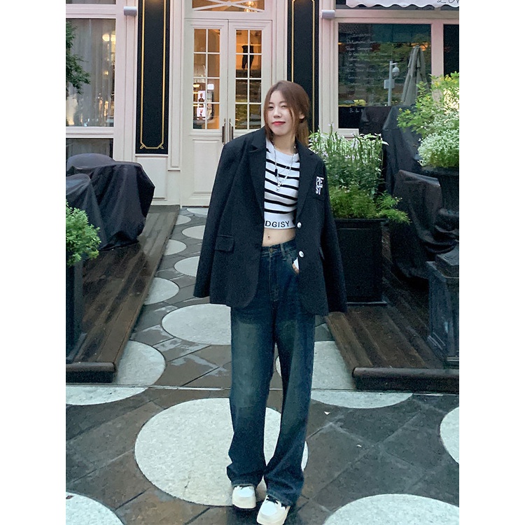 Bahu depan pendek hitam dan putih bergaris sweater wanita awal musim gugur manis dan keren desain lengan panjang slim-fit top sweater bottoming kemeja