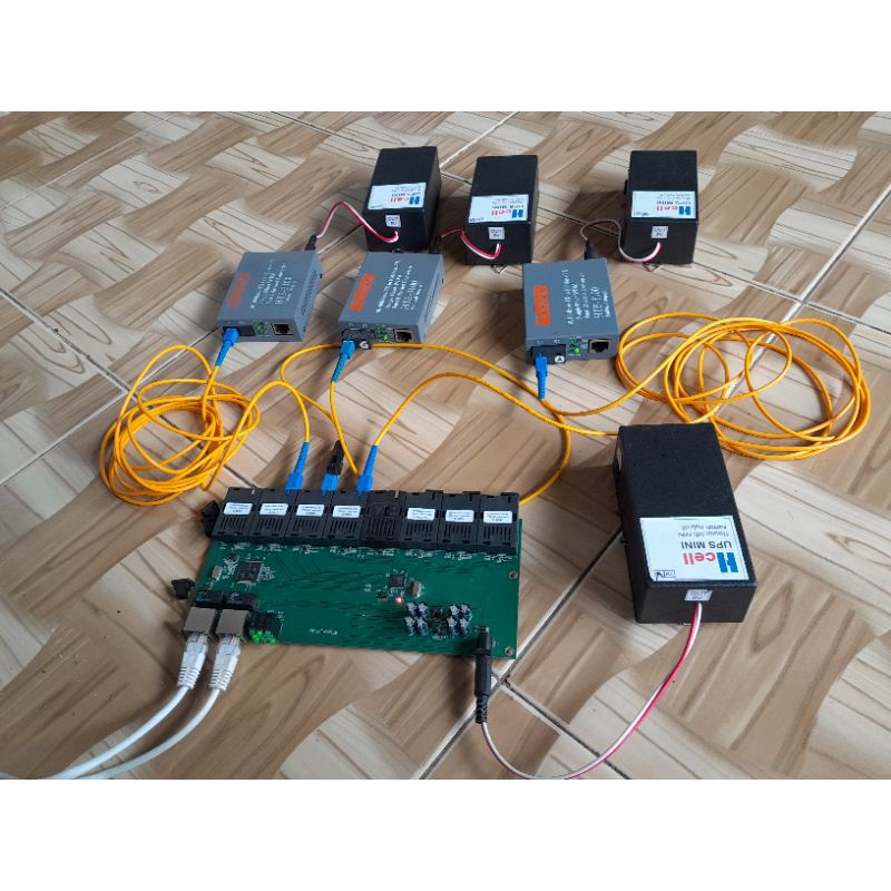 ups mini plus batrai in 12v out 5v, 9v 2 amper cocok untuk htb