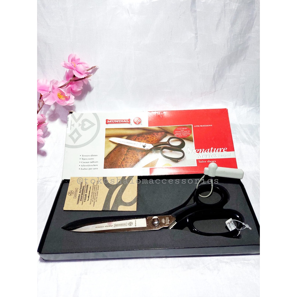 

Gunting Potong Bahan Kain Merek Mundial Serra 9
