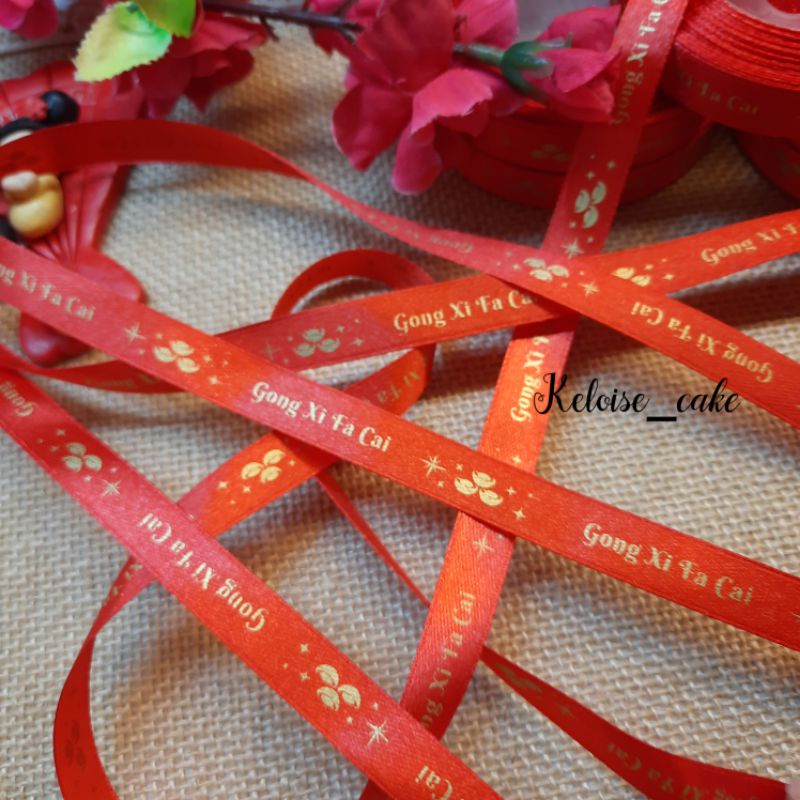 

PITA CNY/IMLEK/SINCIA/CHINESE NEW YEAR SATIN MERAH LEBAR 1 CM