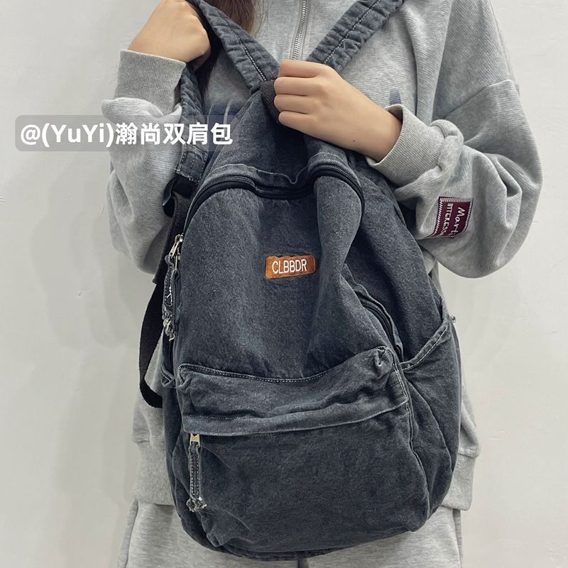 Sera mahasiswa Amerika high street retro denim ransel tua dicuci tas sekolah malas siswa ransel untuk pria dan wanita