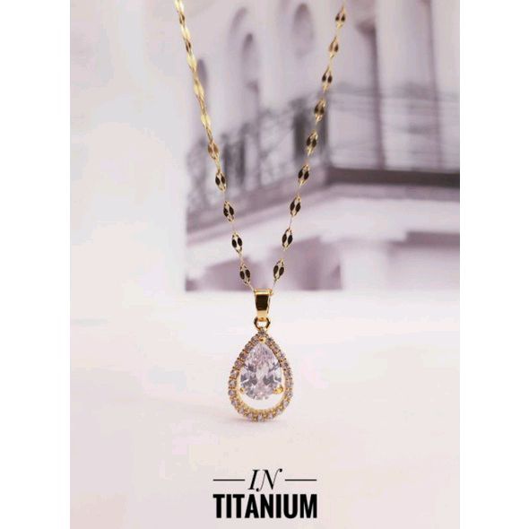 Kalung Titanium Oval Permata Gold 1114a