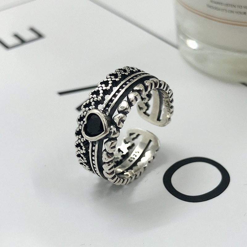 Cincin Model Terbuka Desain Hollow Warna Silver Gaya Vintage Untuk Wanita