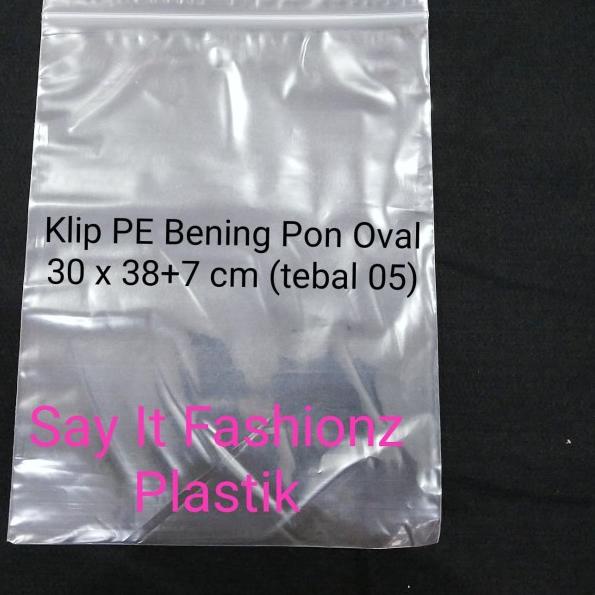 

Kantong Plastik Klip Pon Oval PE Bening 30x38+7cm tebal 05 isi 100lbr