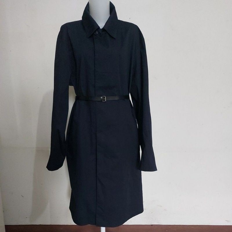 Coat waterproof kancing