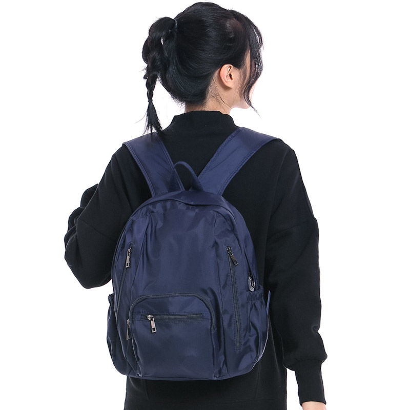 sera multi-saku ringan tahan air ransel kasual perjalanan trendi fashion keren tas sekolah ransel wanita unisex