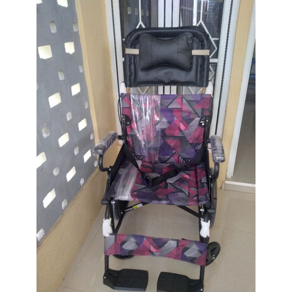 Kursi roda treveling avico arjuna