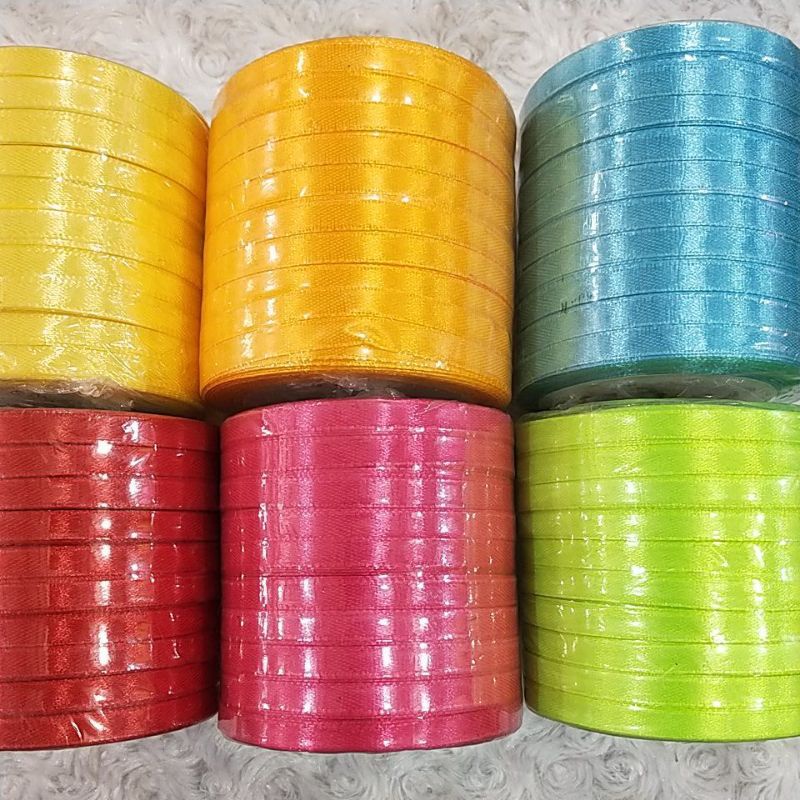 

Pita Satin 1/4 Inci PER PAK 10 GULUNG