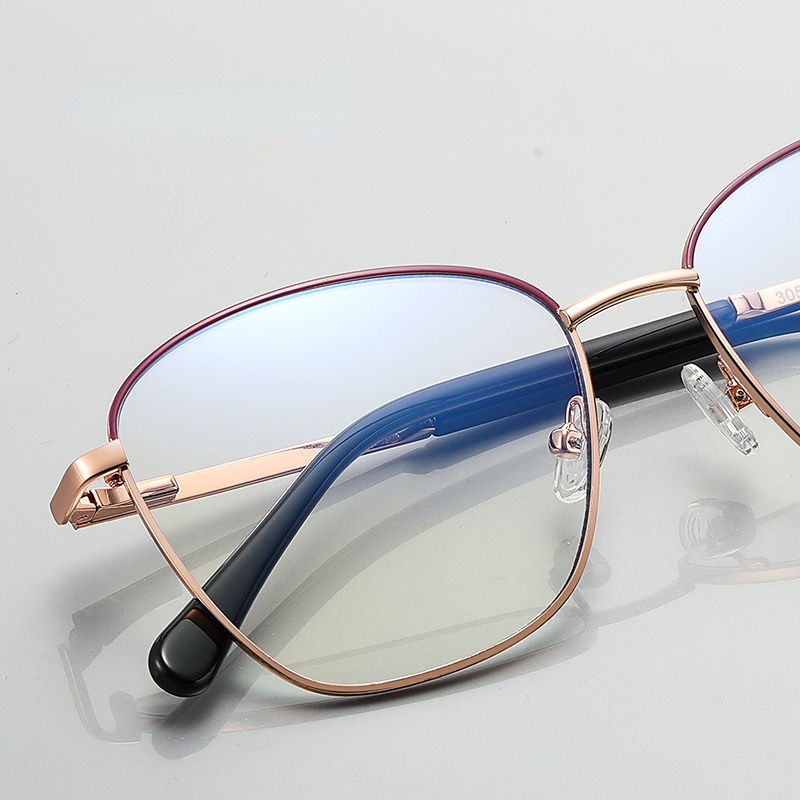 Kacamata Optik Model Mata Kucing Oversize Anti Blue Light Bahan Metal Untuk Wanita