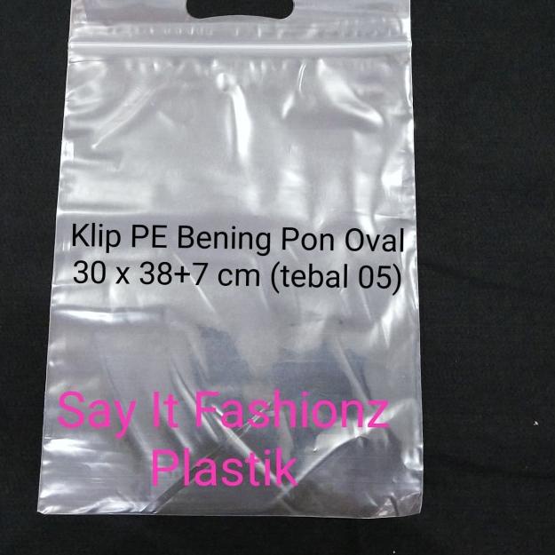 

Kantong Plastik Klip Pon Oval PE Bening 30x38+7cm tebal 05 isi 100lbr